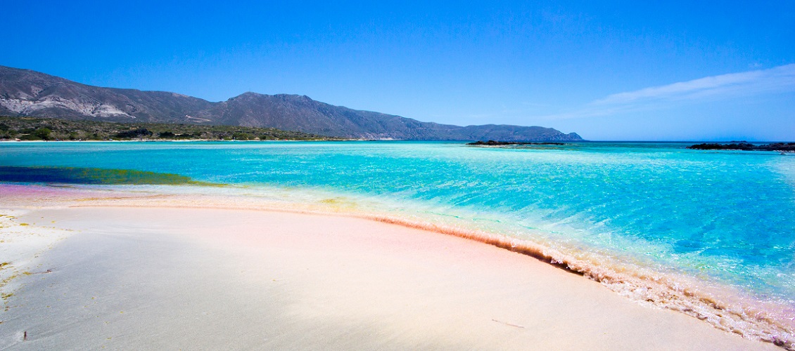 A beach in Crete, Greece with crystal clear blue water